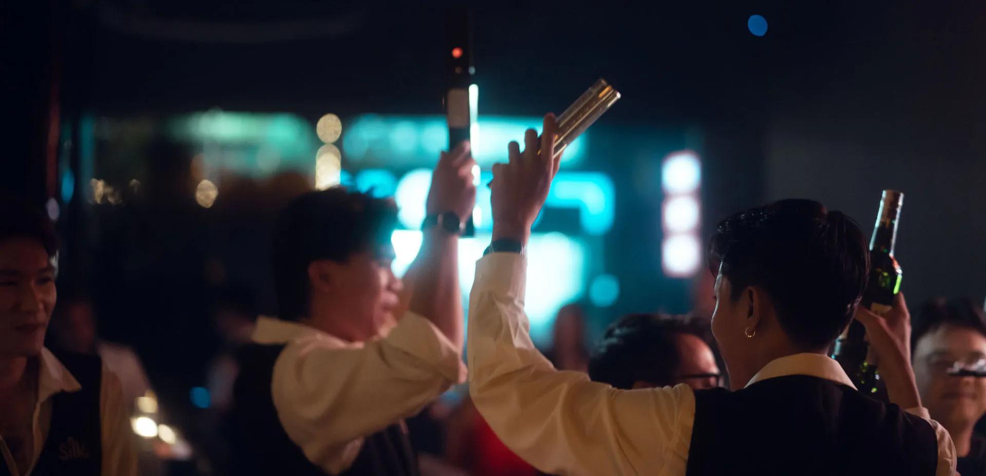 Crowd with hands raised during DJ night at Silk Lounge District 1 Saigon